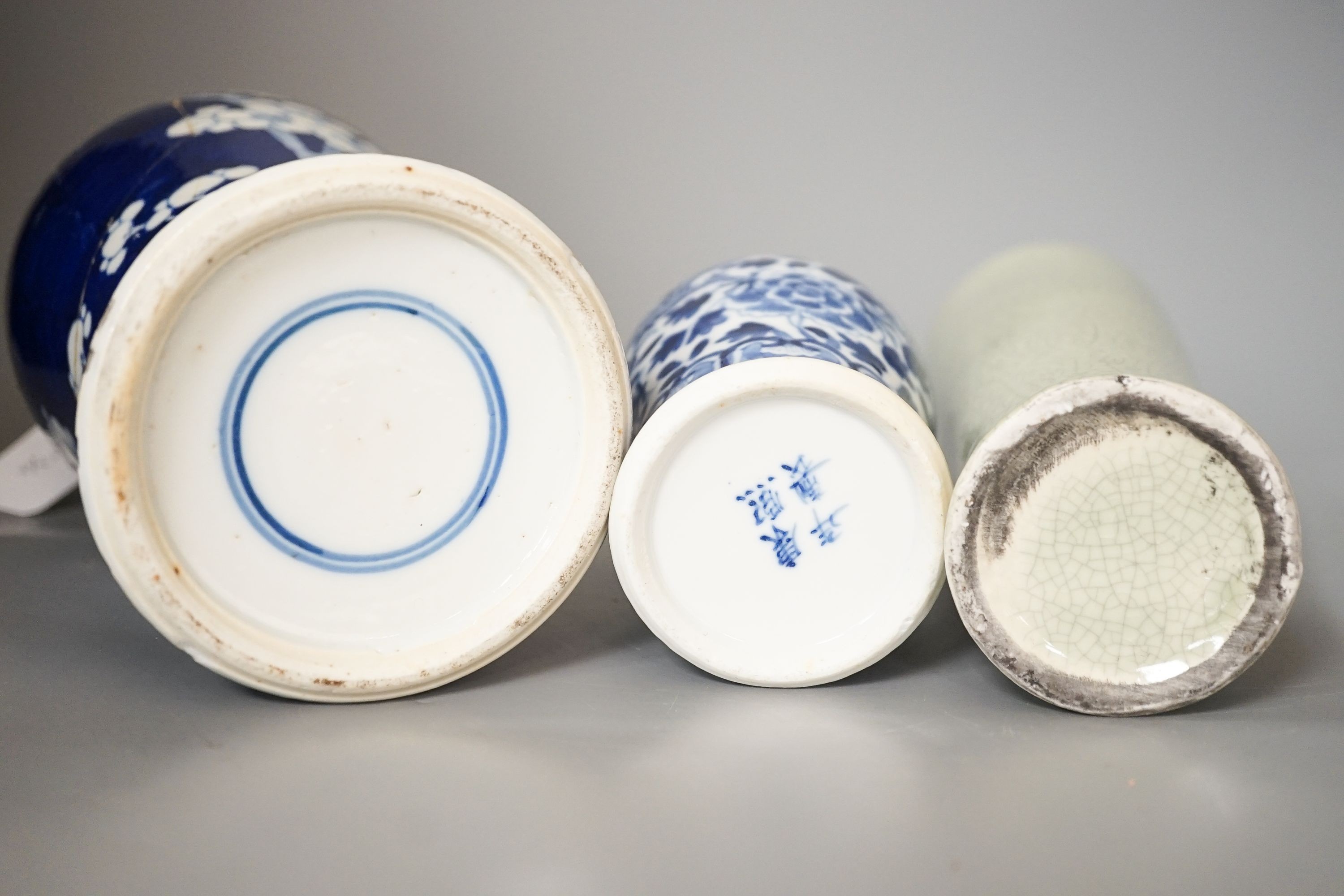 Two Chinese blue and white vases and a slender crackle glaze vase, Qing and later 30cm